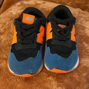 New Balance Kids' Black, Orange, and Blue Sneakers